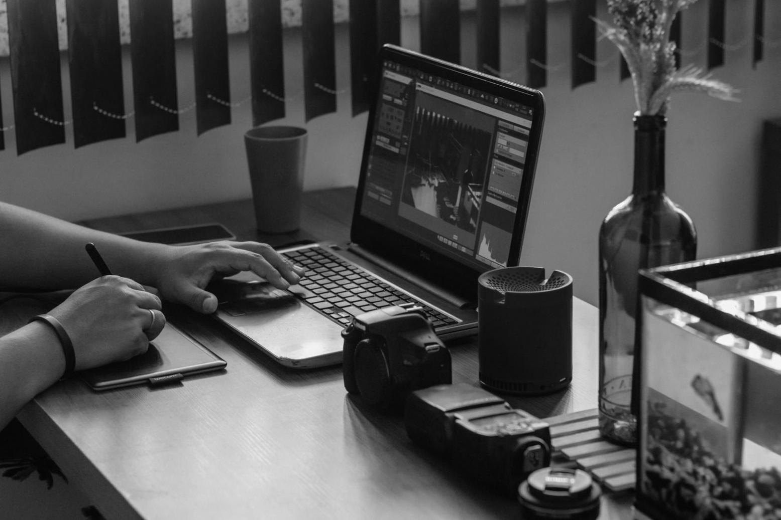 Close-up of hands working on complex financial calculations and data analysis